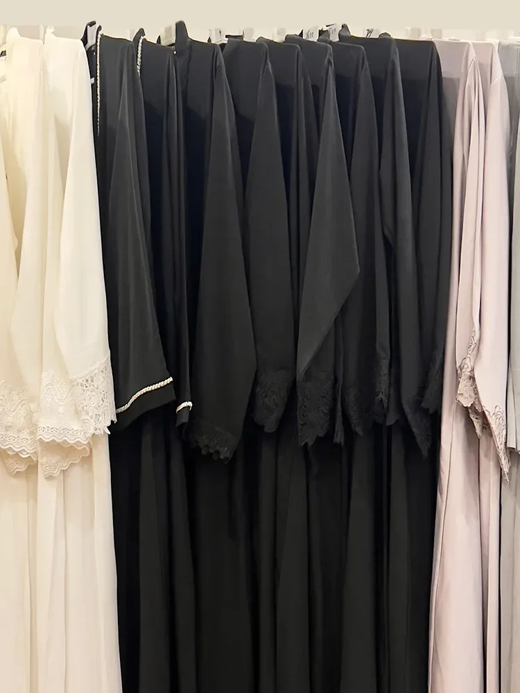 black, white and grey premium turkish abayas with detaling on sleeves