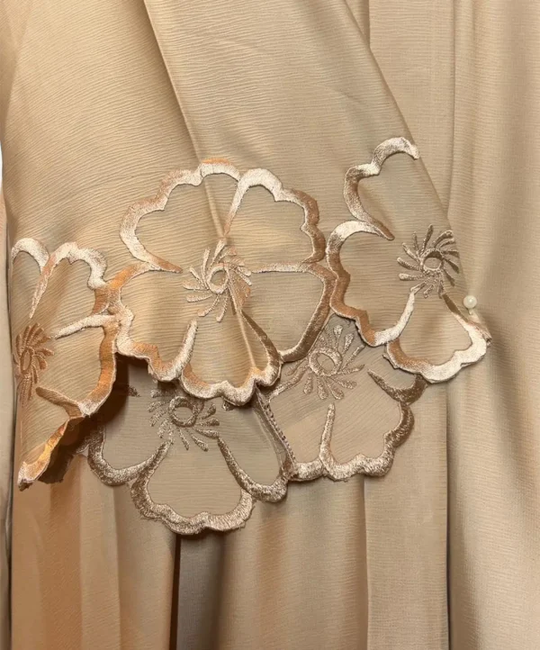 Beige-Floral-Embroidered-Abaya-closeup-sleeve-view close up sleeve view of beige floral embroidered abaya