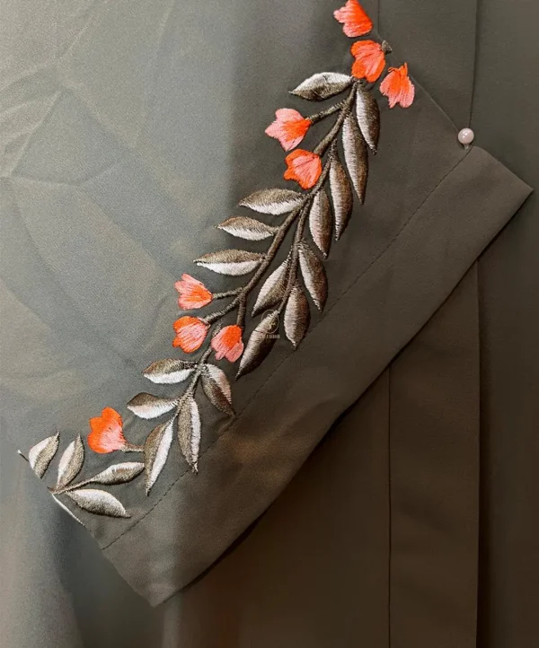 Matcha-Bloom-Embroidered-Abaya-closeup-sleeve-view close up sleeve view of matcha bloom embroidered abaya